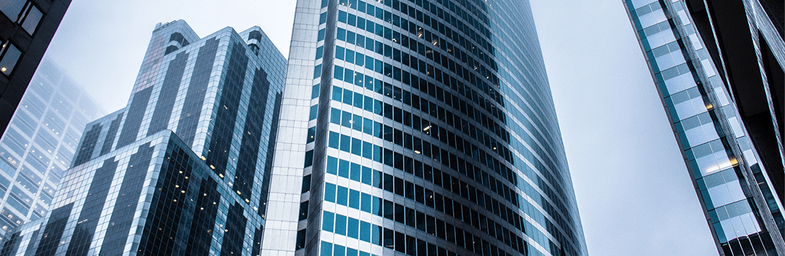 image Street viewpoint looking up at office towers grey sky